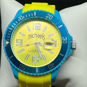 Michael’s diving watch, water resistant, yellow silicone band, unisex, 2.” Face